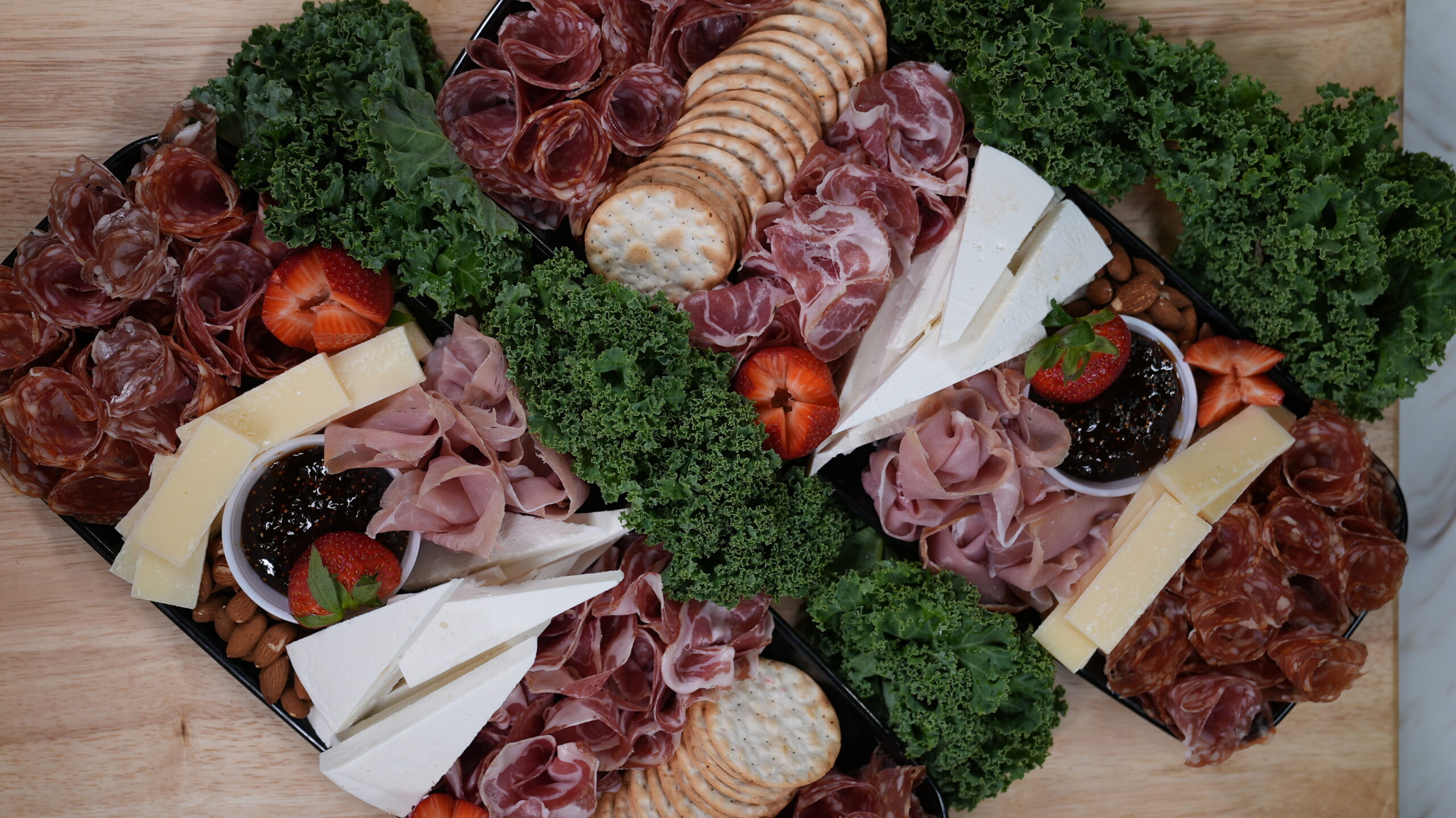 Charcuterie board from Livoti's Old World Market with meats, cheese, and crackers