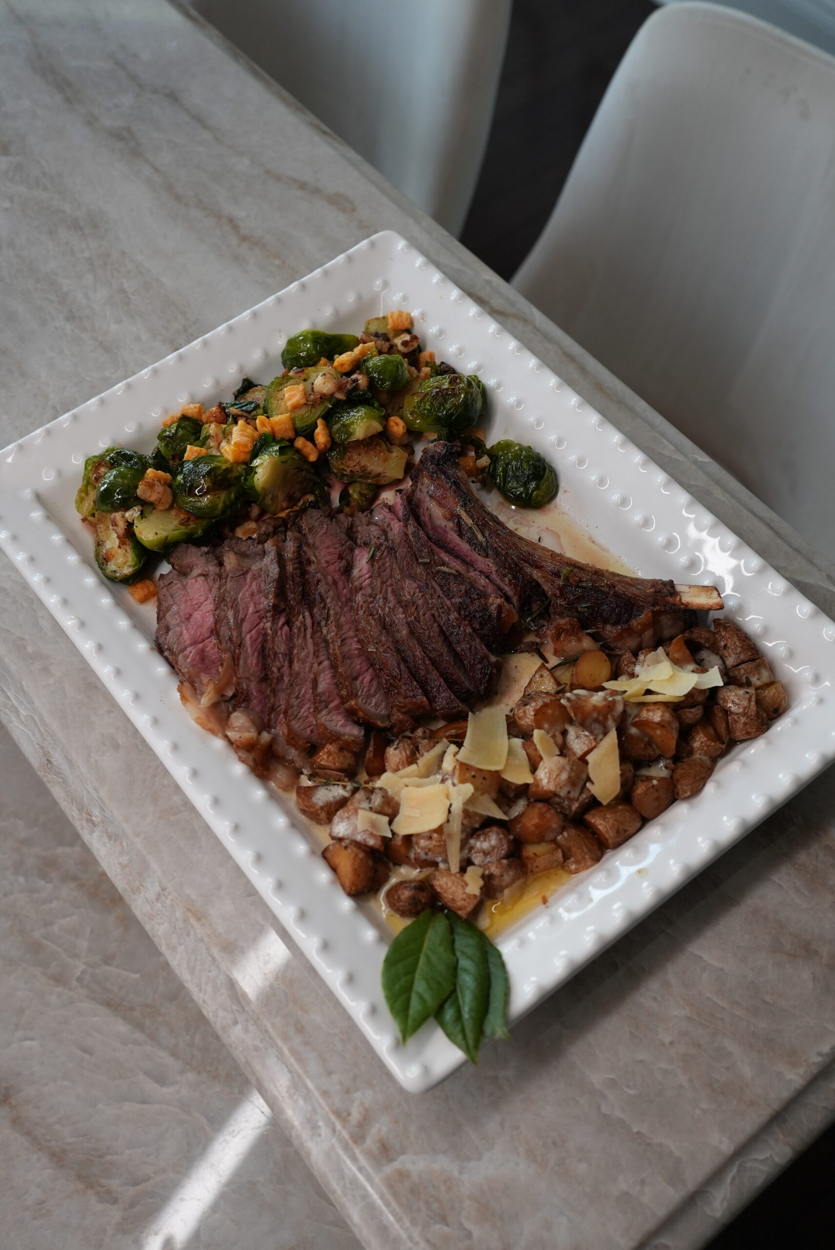 Steak, potatoes, and vegetables prepared by the Livoti's Old World Market catering team